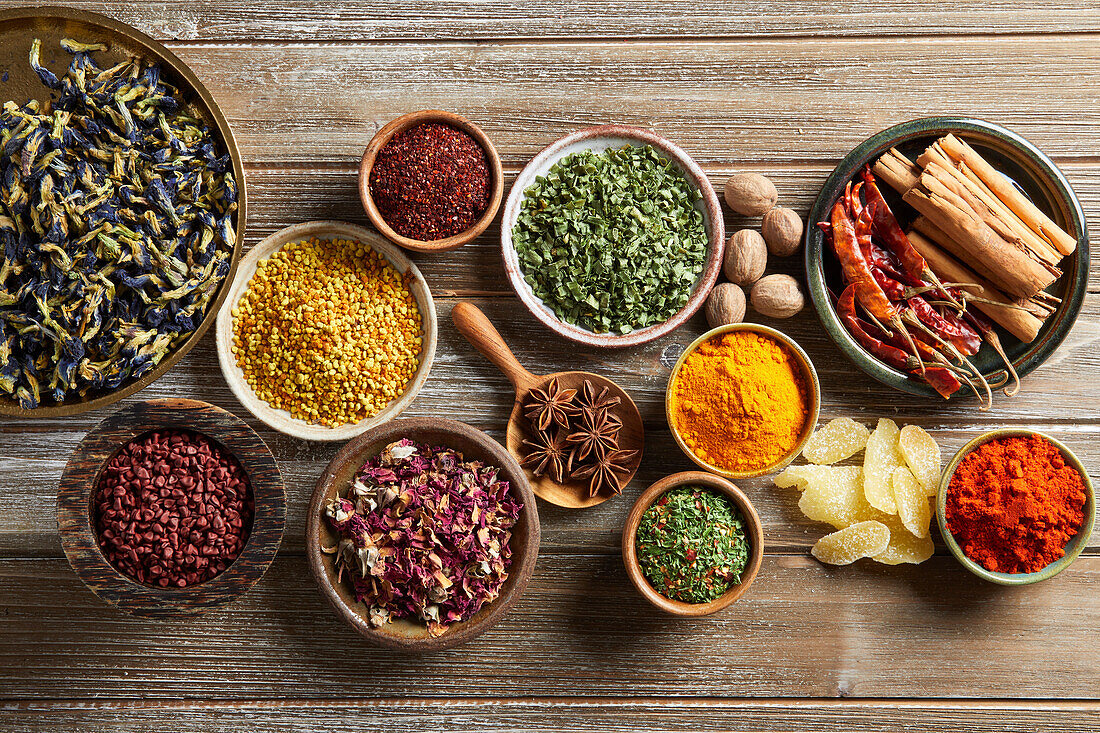 Group of Herbs & Spices on a Dark Wooden Background