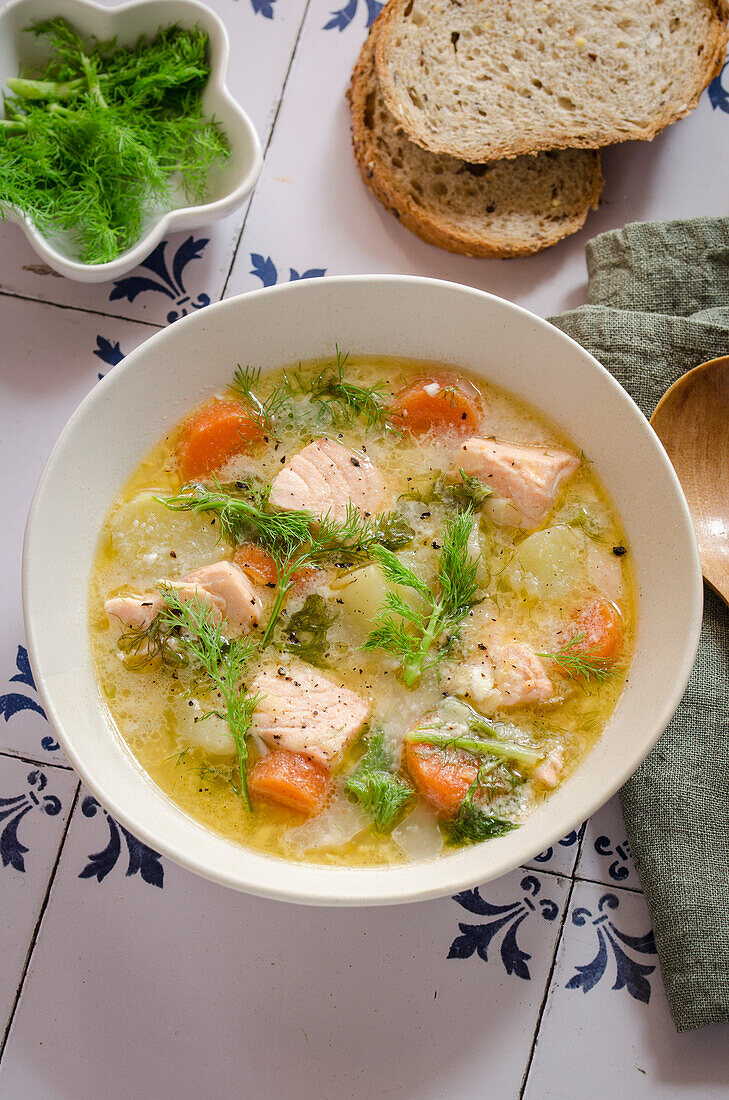 Finnish salmon soup with fresh vegetables