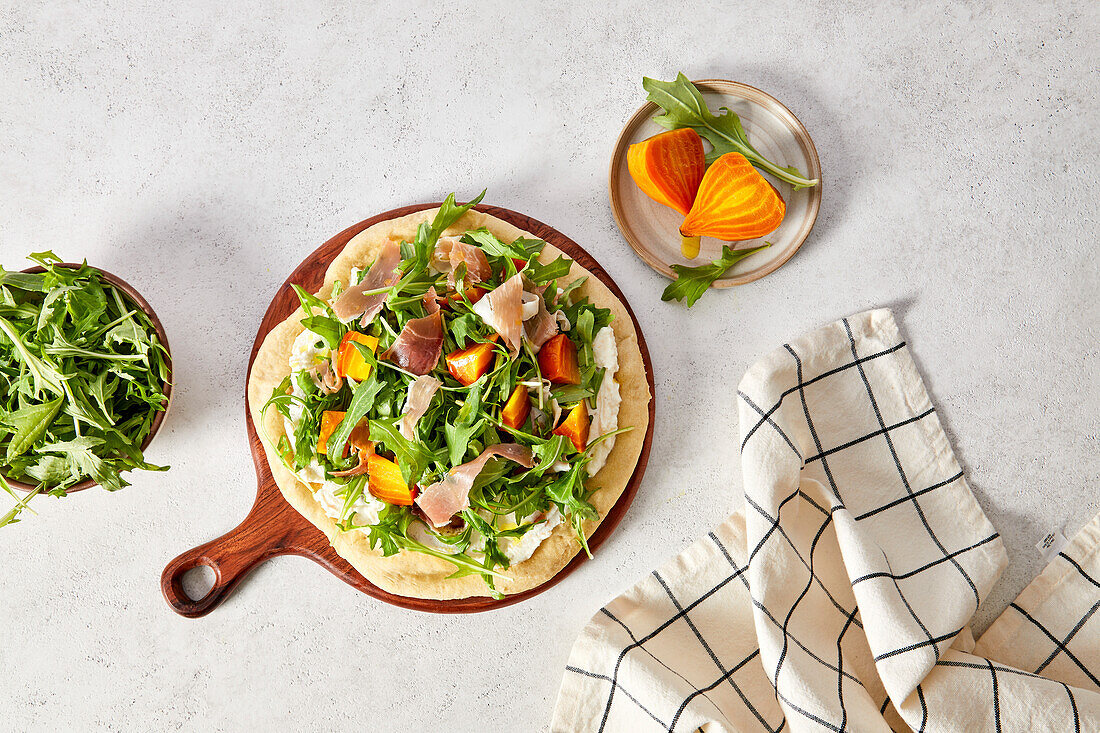 Salad Pizza with Arugula, Prosciutto and Golden Beets