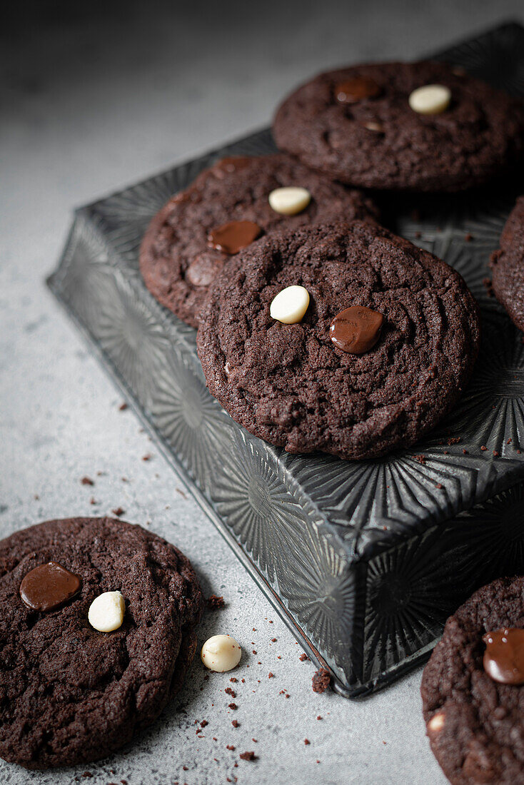 Double chocolate chip cookie on a silver tray