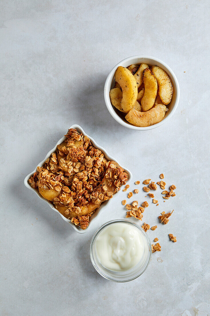 Apple granola on a neutral background with soft shadows