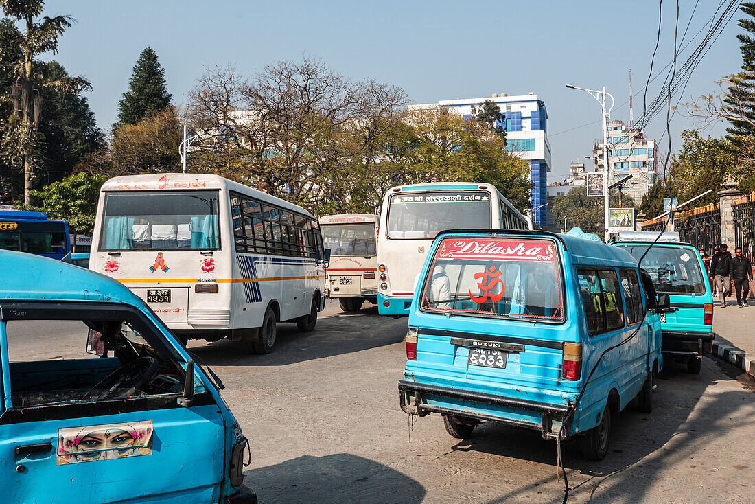 Different types of public transport buses ready to be boarded at New Road, Kathmandu, Nepal, Asia