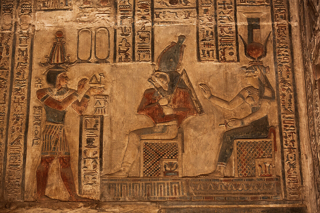 Reliefs of Pharaoh on left, God Horus in center, and Goddess Hathor on right, Sanctuary, Temple of Hathor, Dendera, Qena, Egypt, North Afica, Africa