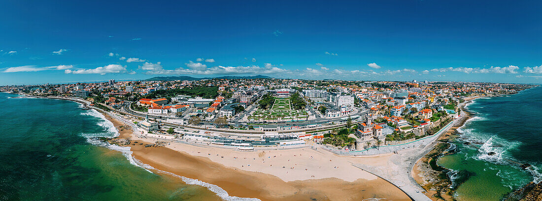 Aerial drone panoramic view of Tamariz beach with iconic Casino Estoril in the centre and Estoril neighbourhood on the Portuguese Riviera 28km west of Lisbon, Portugal, Europe