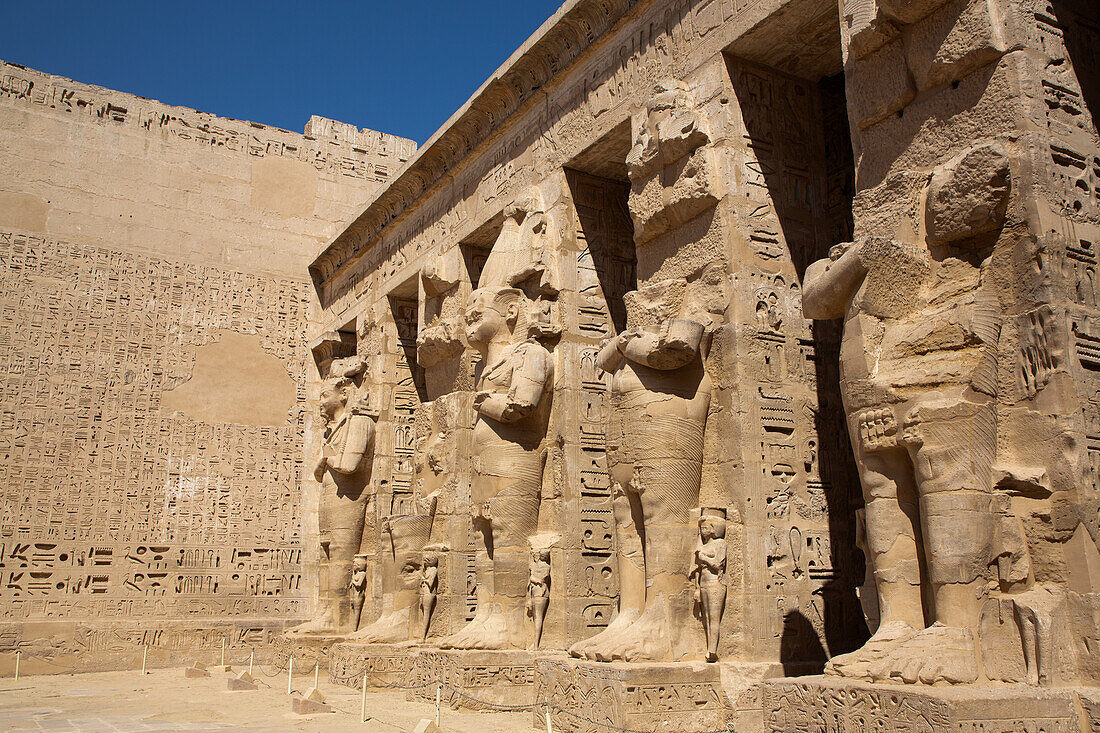 Osirian Statues, Northern Portico, First Courtyard, Medinet Habu, Mortuary Temple of Ramesses III, 1187-56 BCE, Ancient Thebes, UNESCO World Heritage Site, Luxor, Egypt, North Africa, Africa