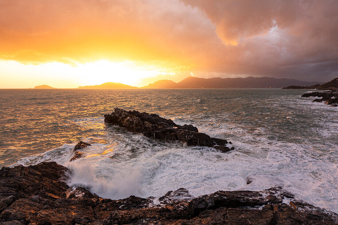 An amazing sunset captured along the Tellaro cliff during a winter day, Lerici, La Spezia province, Italy, Europe