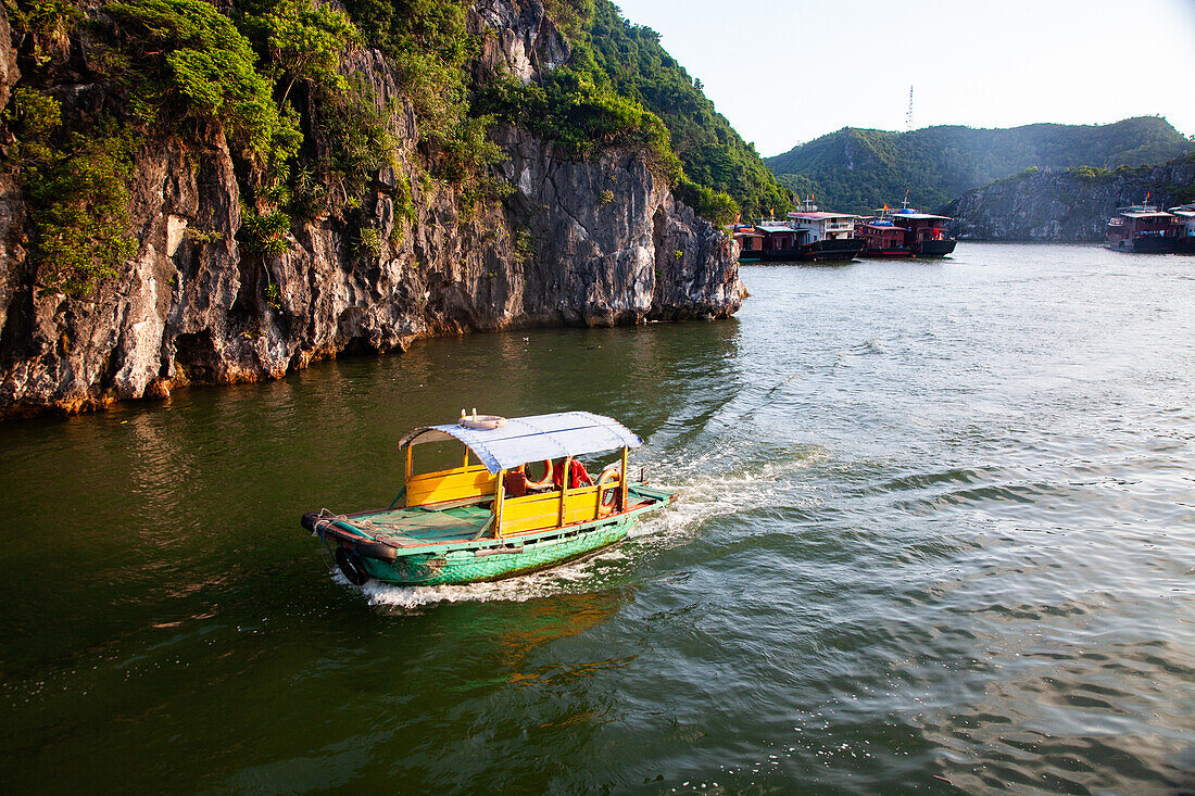 Ha Long Bay from Cat Ba island, Ha Long city in the background, UNESCO World Heritage Site, Vietnam, Indochina, Southeast Asia, Asia