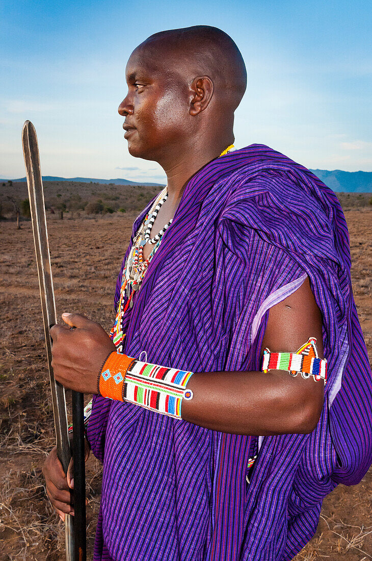 Maasai with spear in the bush, Mwatate, Lualenyi ranch, Kenya, East Africa, Africa