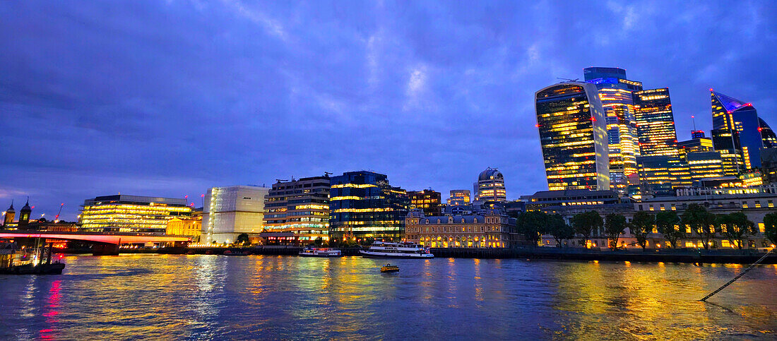 London skyline at dusk from Hays Galleria near London Bridge, London, England, United Kingdom, Europe