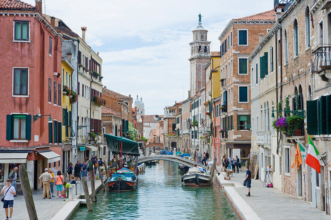 The Fondamenta Del Squero, the Ponte dei Pugni with the Church of Santa Maria Dei Carmini in the background, Venice, UNESCO World Heritage Site, Veneto, Italy, Europe