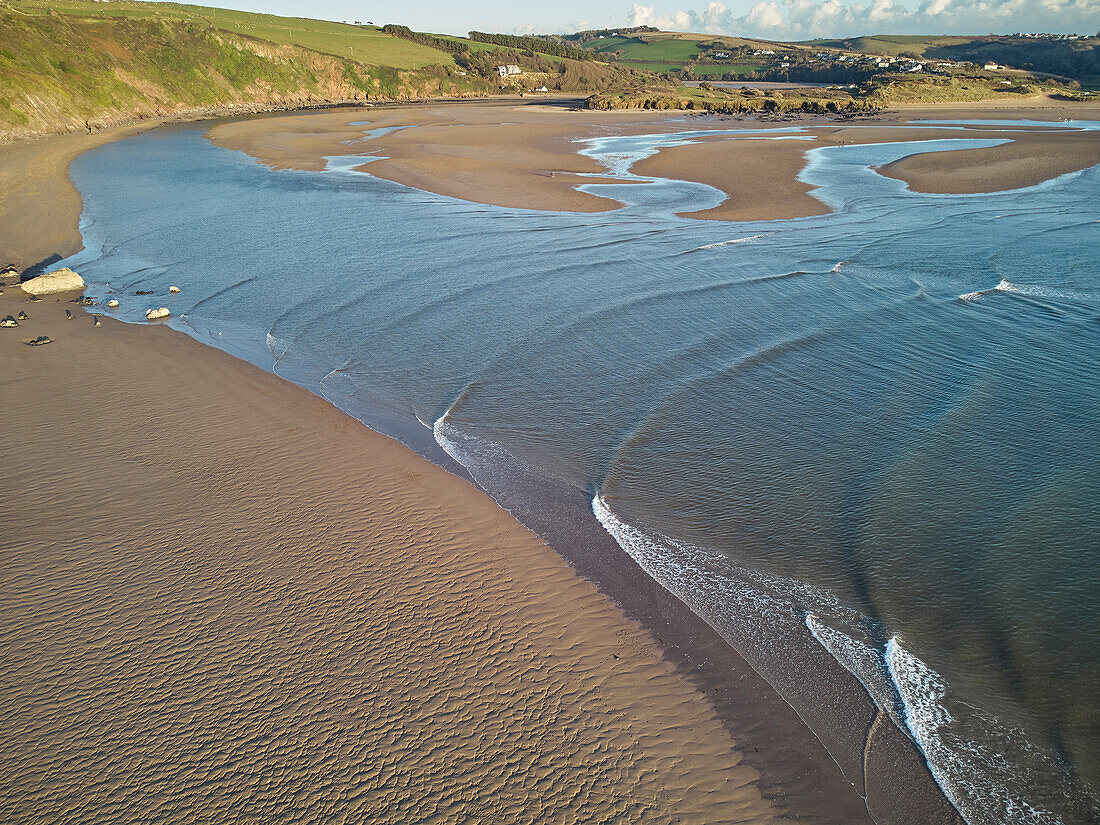 An aerial view of sand banks at low tide, in the mouth of the River Avon, at Bigbury, on the south coast of Devon, England, United Kingdom, Europe