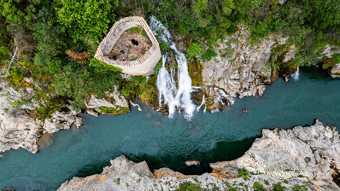 Aerial of an old watchtower in the Herault gorge, UNESCO World Heritage Site, Causses and Cevennes, Herault, Occitanie, France, Europe