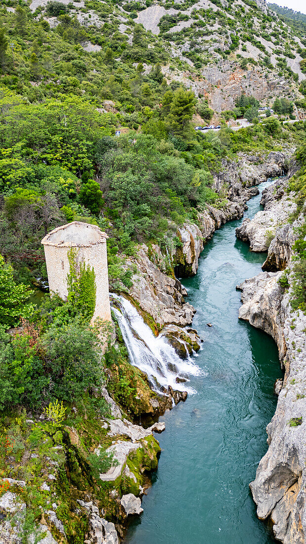 Aerial of an old watchtower in the Herault gorge, UNESCO World Heritage Site, Causses and Cevennes, Herault, Occitanie, France, Europe