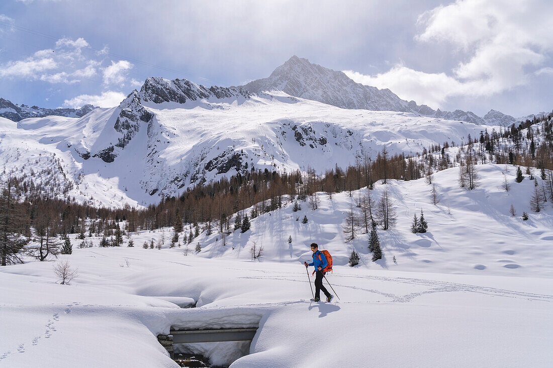 Hiking in Adamello park in Winter season, Vallecamonica, Brescia province, Lombardy district, Italy, Europe