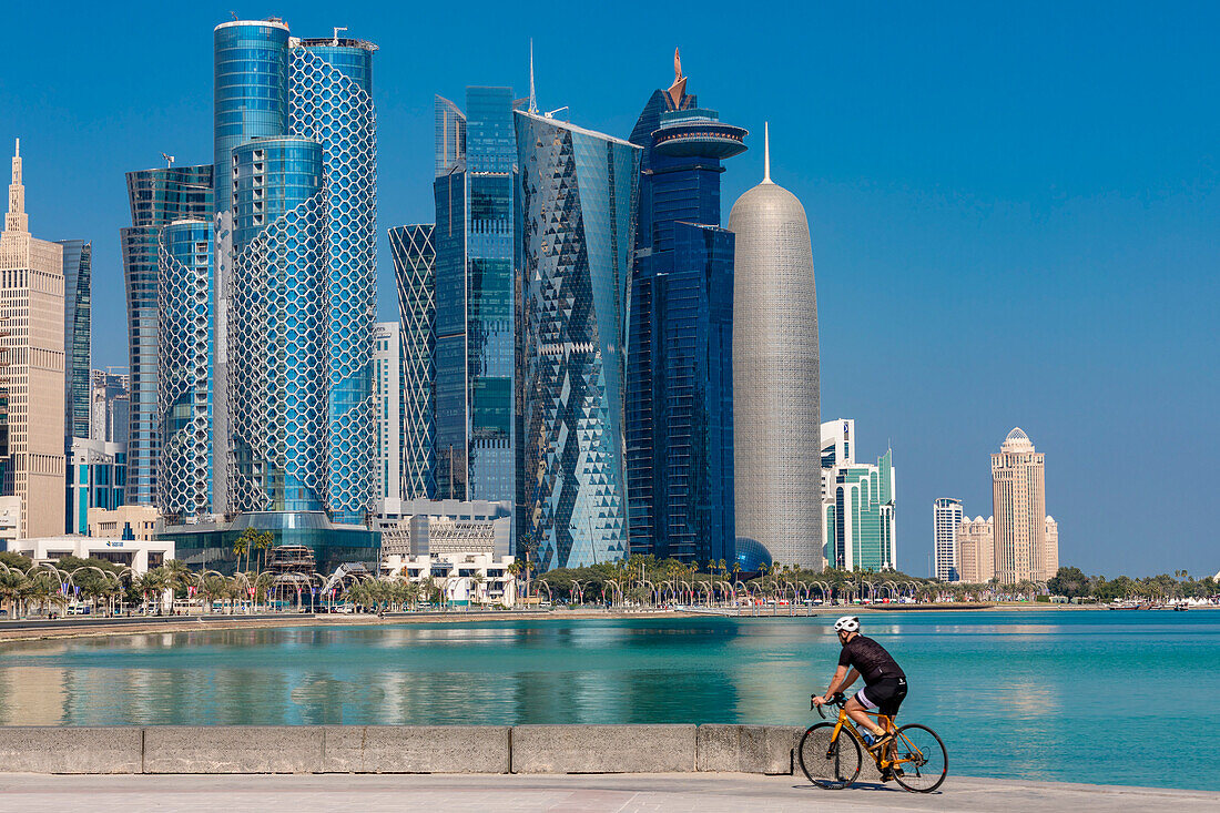 A Cyclist against the West Bay Skyline, Doha, Qatar, Middle East