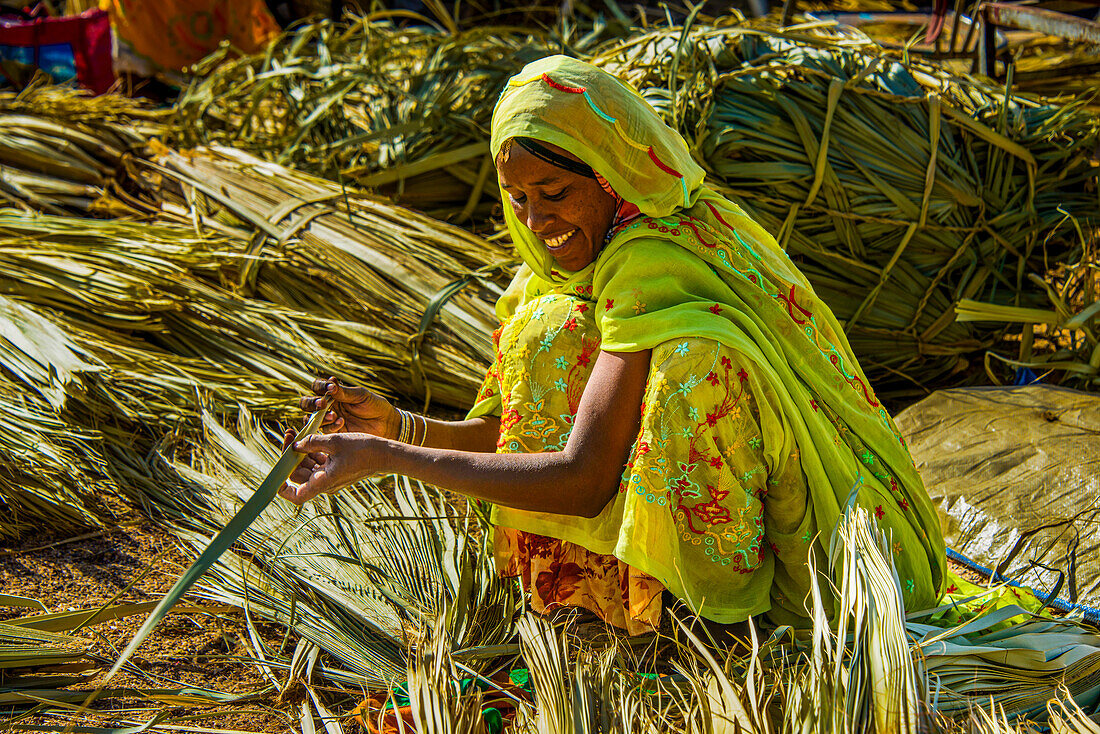 Woman selling her goods on the colourful Monday market of Keren, Eritrea, Africa