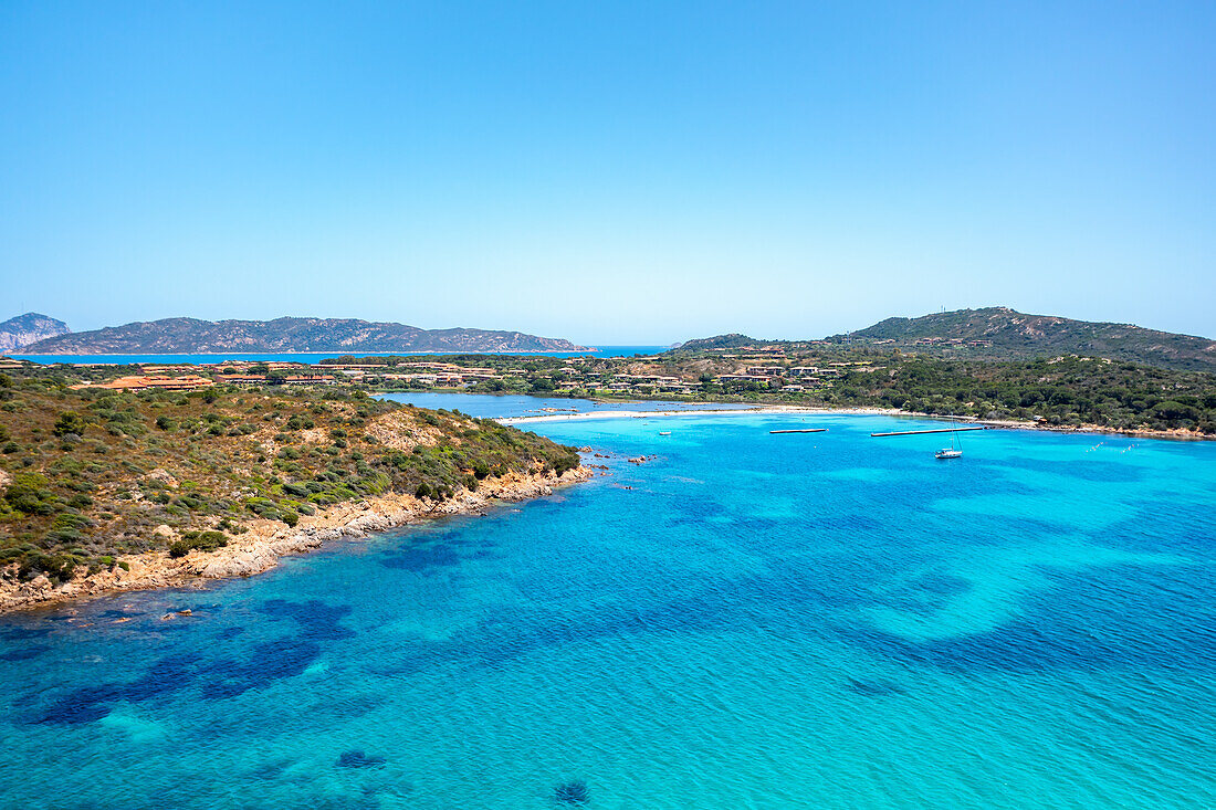 Drone aerial view of Salina Bamba beach with white sand and turquoise water, Sardinia, Italy, Mediterranean, Europe