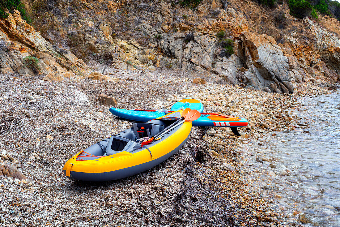 Kayak and paddles on a rocky beach, Sardinia, Italy, Mediterranean, Europe