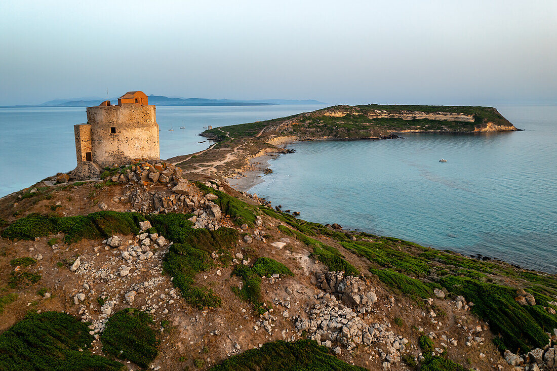 San Giovanni di Sinis historic tower, drone aerial view of San Marco Cape at sunset, Sardinia, Italy, Mediterranean, Europe