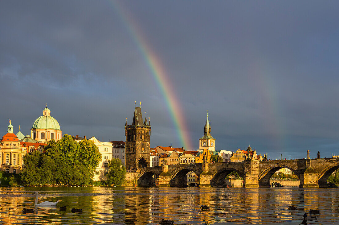 Rainbow above Charles Bridge at sunset, UNESCO World Heritage Site, Old Town, Prague, Czech Republic (Czechia), Europe