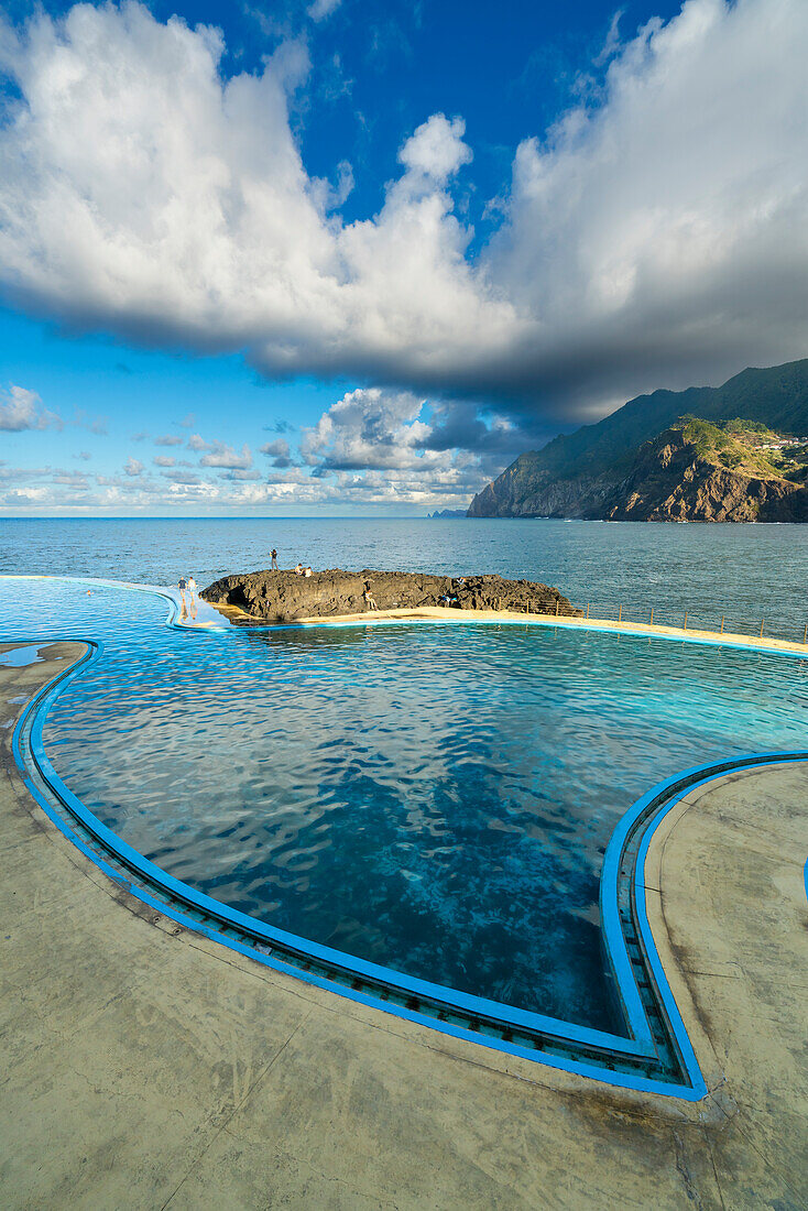 Coastal swimming pools near mountains at Porto da Cruz, Machico District, Madeira, Portugal, Atlantic, Europe