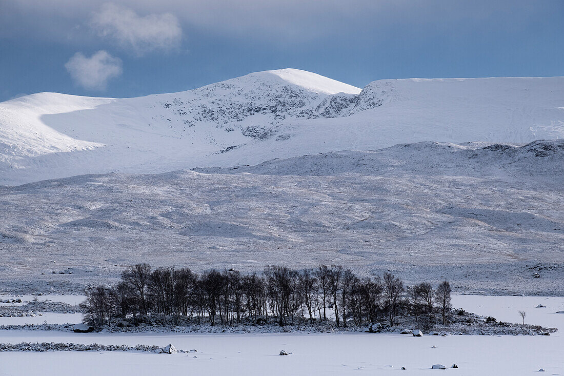 A frozen Loch Ba backed by Beinn a Chreachain in winter, Rannoch Moor, Argyll and Bute, Scottish Highlands, Scotland, United Kingdom, Europe