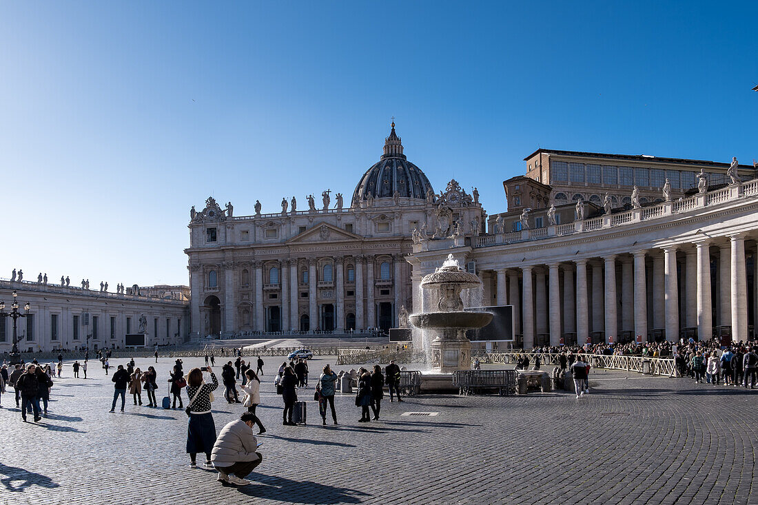 View of Saint Peter's Square in Vatican City, the papal enclave in Rome, with St. Peter's Basilica in the background, UNESCO World Heritage Site, Rome, Lazio, Italy, Europe