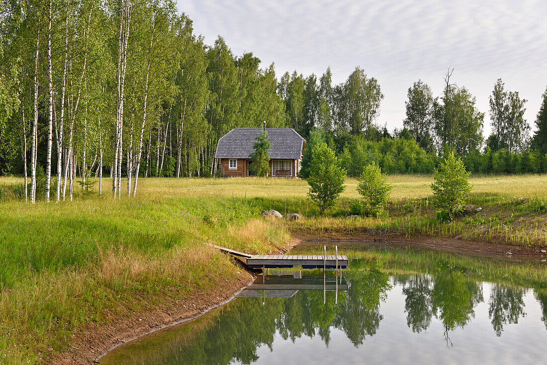 Small lake on the homestead, Miskiniskes rural accommodations, Aukstaitija National Park, Lithuania, Europe