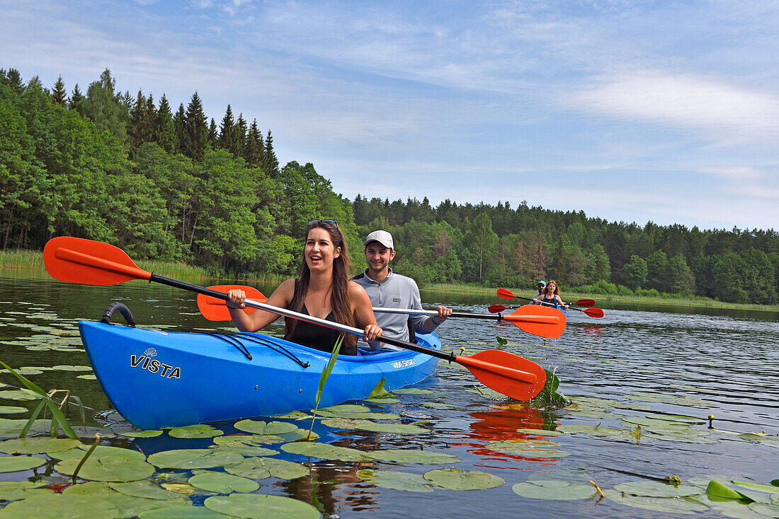 Canoe trip on Baluosykstis lake around Ginuciai, Aukstaitija National Park, Lithuania, Europe