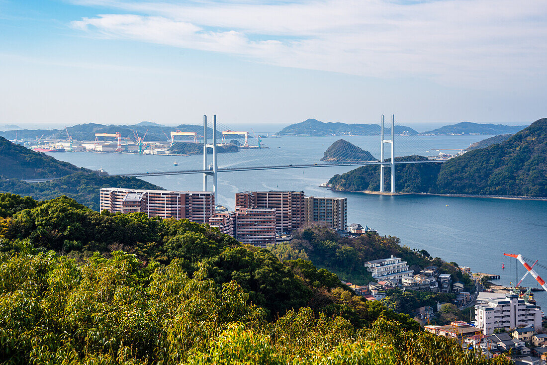 Megami Bridge crossing the bay of Nagasaki Bay, with islands and coast of Kyushu, Japan, Asia