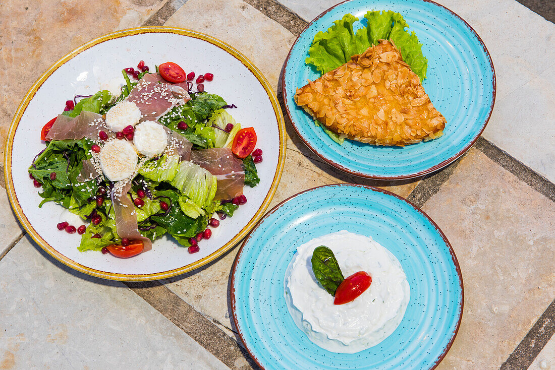 Dishes served at the Castle restaurant, located in an old fortress (Lekursi) overlooking the bay of Saranda, Albania, Europe