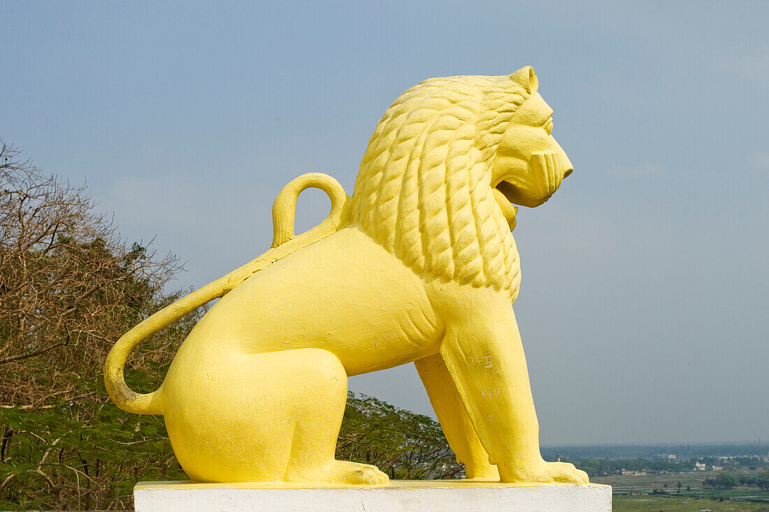 One of four guardian lions, Dhauligiri Shanti Stupa (Dhauli Peace Pagoda), completed in 1972 with the collaboration of Nippon Buddha Sangha, atop Dhauli Hills on site of ancient temple, Bhubaneswar, Odisha, India, Asia