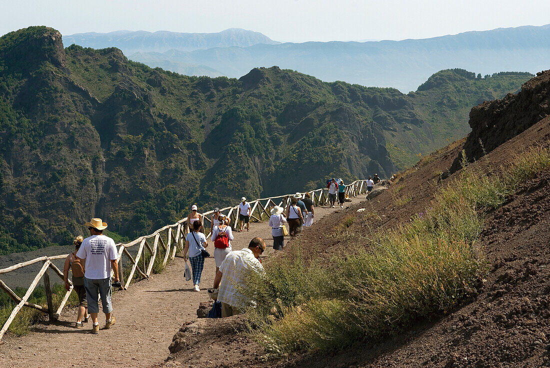 People walking on the edge of the crater of Mount Vesuvius, Province of Naples, Campania region, Italy, Europe