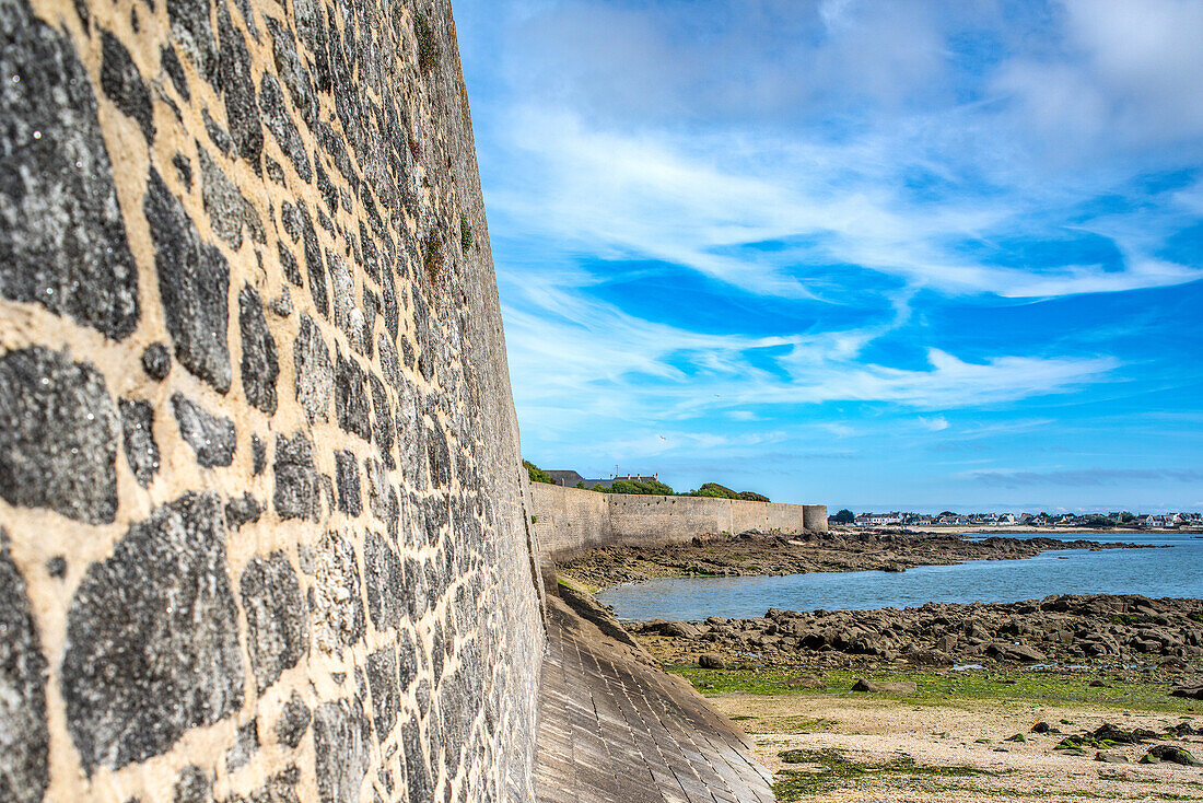 A stunning view of the Port Louis Citadelle in Lorient, Brittany, France, showcasing the historic architecture with a coastal backdrop.