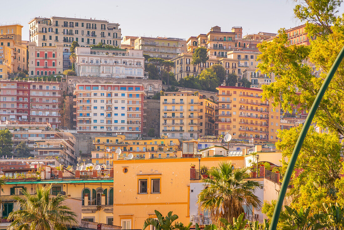 View of pastel coloured villas near Sant'Elmo Castle from Rotonda Diaz, Naples, Campania, Italy, Europe