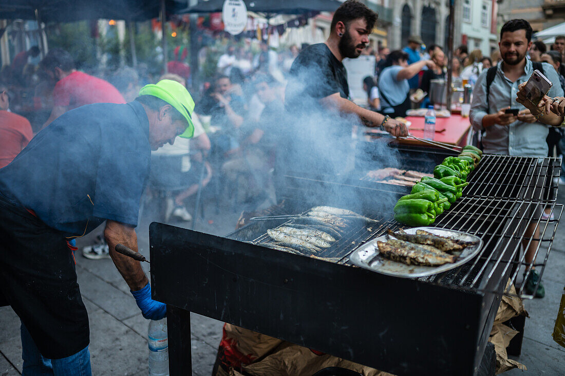 Traditional grilled sardines during Festival of St John of Porto (Festa de São João do Porto ) during Midsummer, on the night of 23 June (Saint John's Eve), in the city of Porto, Portugal