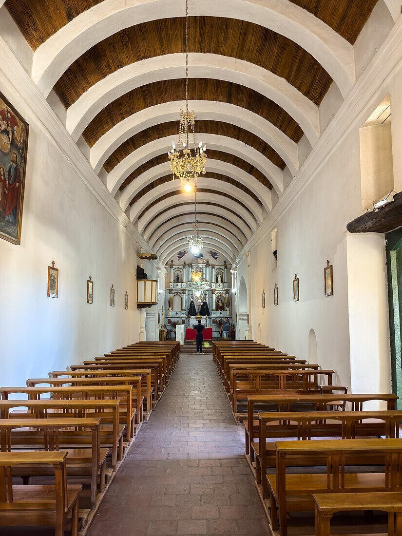 The nave &main altarpiece of the Church of San Jose de Cachi, an 18th Century colonial church in Cachi, Argentina.