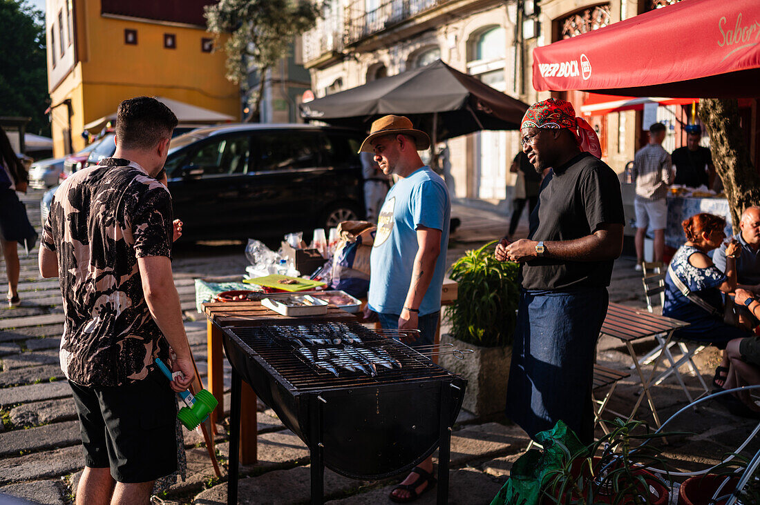 Traditional grilled sardines during Festival of St John of Porto (Festa de São João do Porto ) during Midsummer, on the night of 23 June (Saint John's Eve), in the city of Porto, Portugal