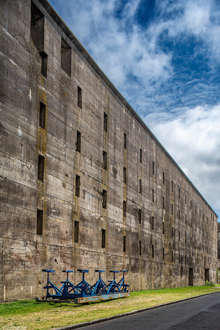 Exterior view of the German submarine base from World War II located in Lorient, Brittany, France, showcasing its historic architecture.