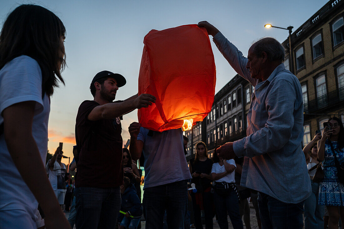 Hot air balloons launching during Festival of St John of Porto (Festa de São João do Porto ) during Midsummer, on the night of 23 June (Saint John's Eve), in the city of Porto, Portugal