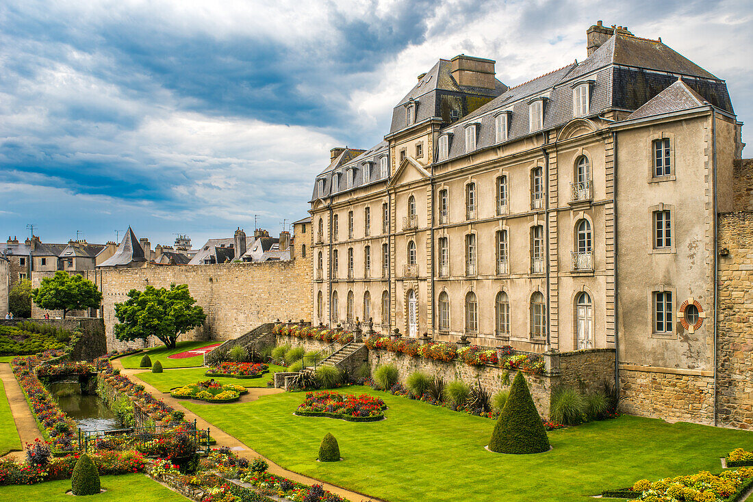 Hermine Castle, an 18th century architectural gem in Vannes, Brittany, France, features a stunningly maintained garden. Perfect for historical and travel themes.