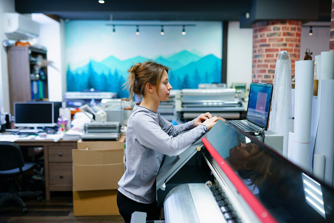 Woman working in printing studio