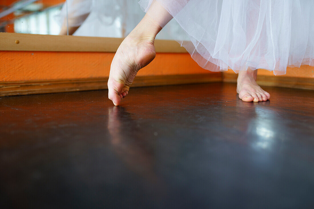 Close-up of ballerinas bare feet