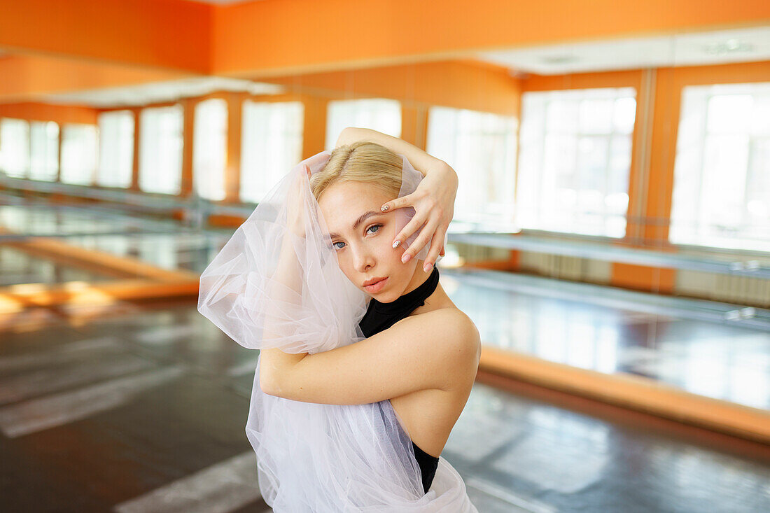 Portrait of ballerina in ballet studio