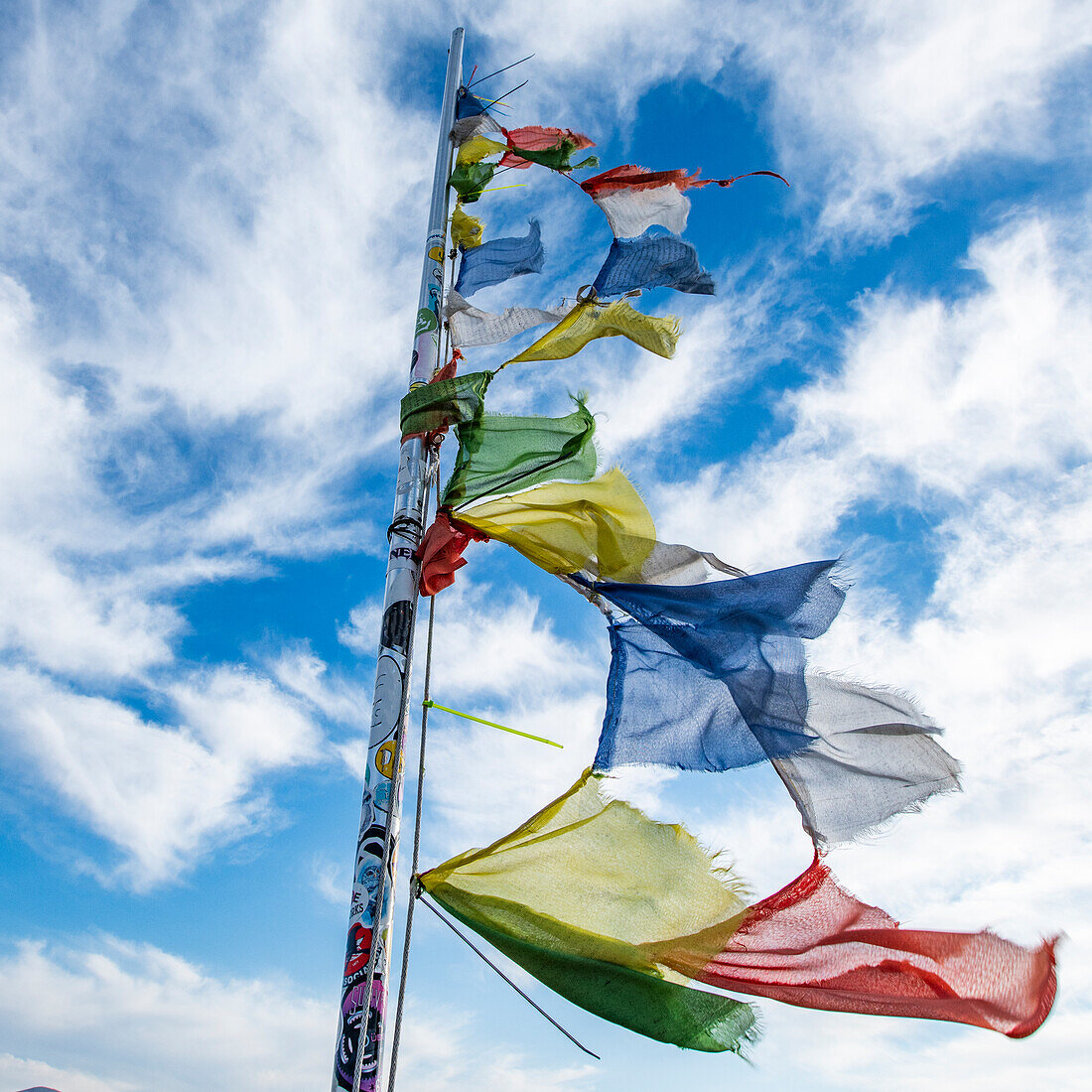 Prayer flags fluttering in wind atop Carbonate Mountain