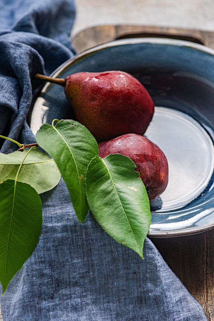 Red Batler pears in a bowl