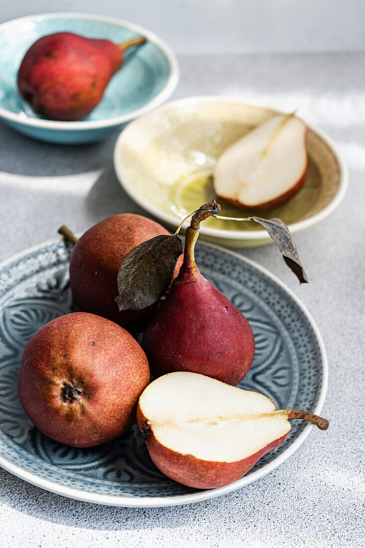 Red Batler pears in bowls