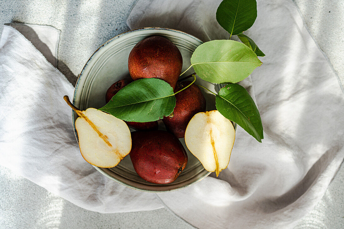 Red Batler pears in a bowl