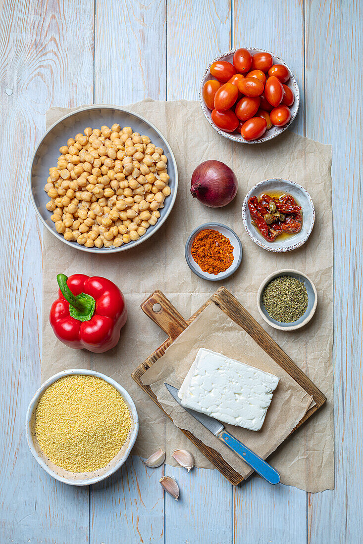 Ingredients for couscous with baked vegetables and feta