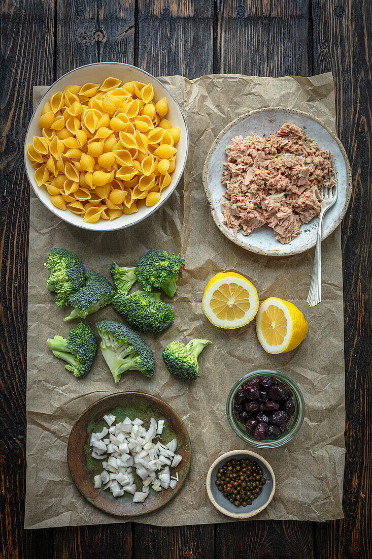 Ingredients for pasta with tuna, broccoli and olives